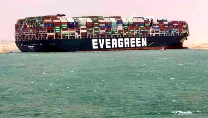 The Ever Given operated by Taiwanese transport company Evergreen Marine is wedged diagonally across the Suez canal